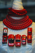Women's jewelry. Red beads and unusual brooches