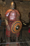 Layout knight in medieval armor. Weapons museum.