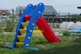 Children's slide in the yard of a private house.