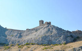 The Genoa fortress to be on the ancient coral reef representing cone-shaped mountain