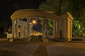 Illuminated Arch in night city park