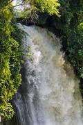 Waterfall. drop of water in the river from the ledge. The sharp drop height of the riverbed and a st