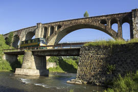 Old abandoned railway bridge over the river Tisza