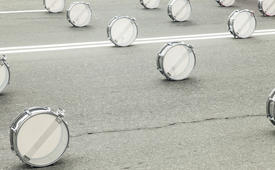 Drums on asphalt wait for drummers for march