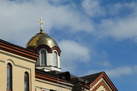 The orthodox church sparkles on the sun the gold domes