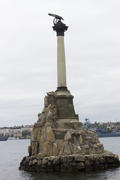 Monument to the flooded Russian ships in a bay