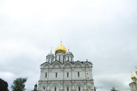 The orthodox church in cloudy weather lights the world with the domes