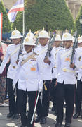 Royal guard on march in an environment of curious crowd