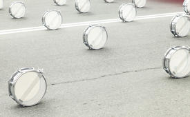 Drums on asphalt wait for drummers for march
