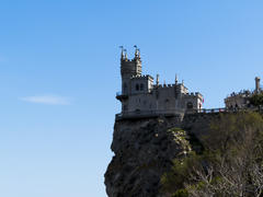 The ancient castle is on the high rock above the sea